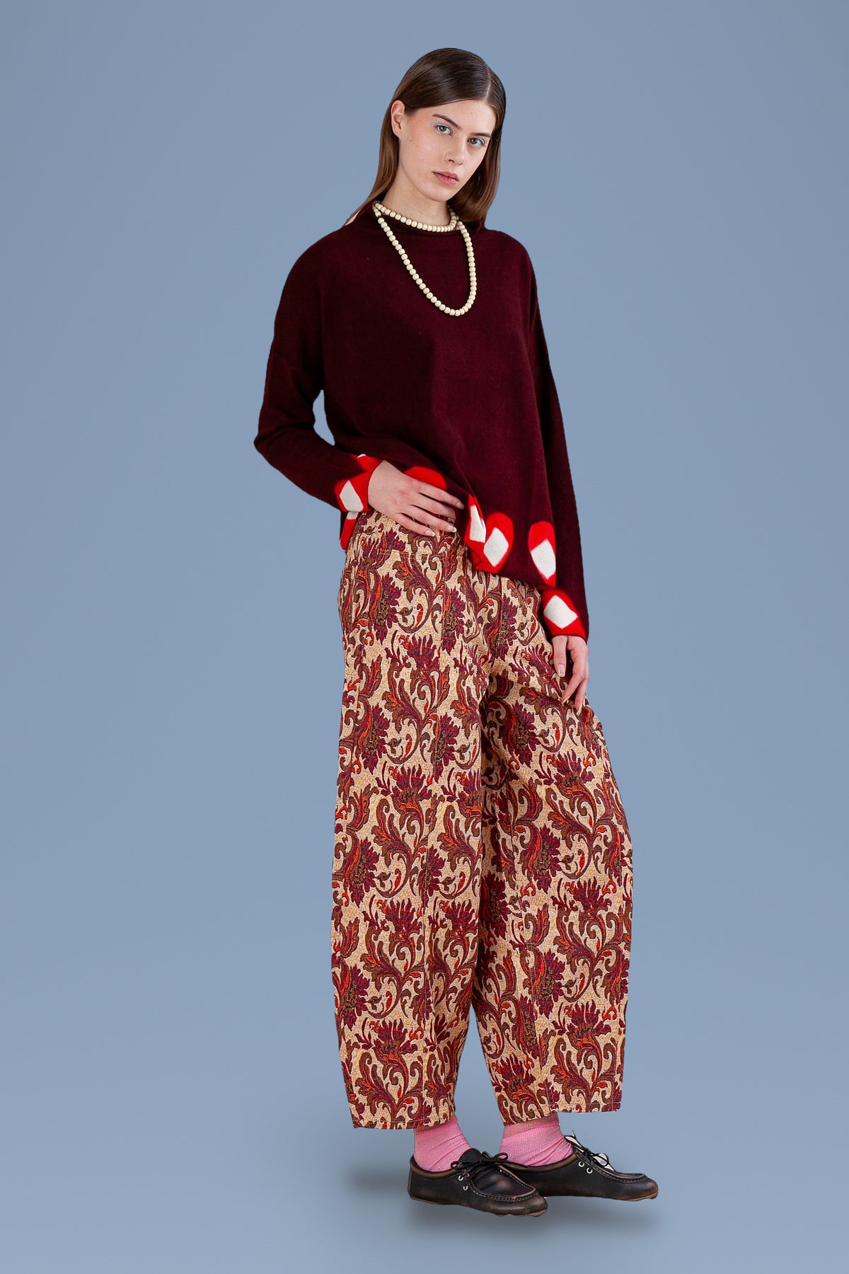 Burgundy high neck sweater, three-quarter view