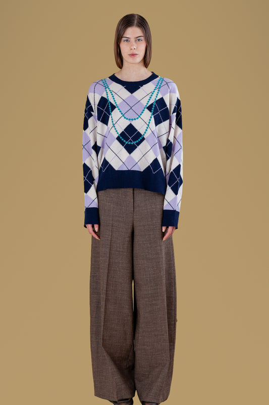 Navy and lilac argyle sweater with embroidered pearl necklaces, front view