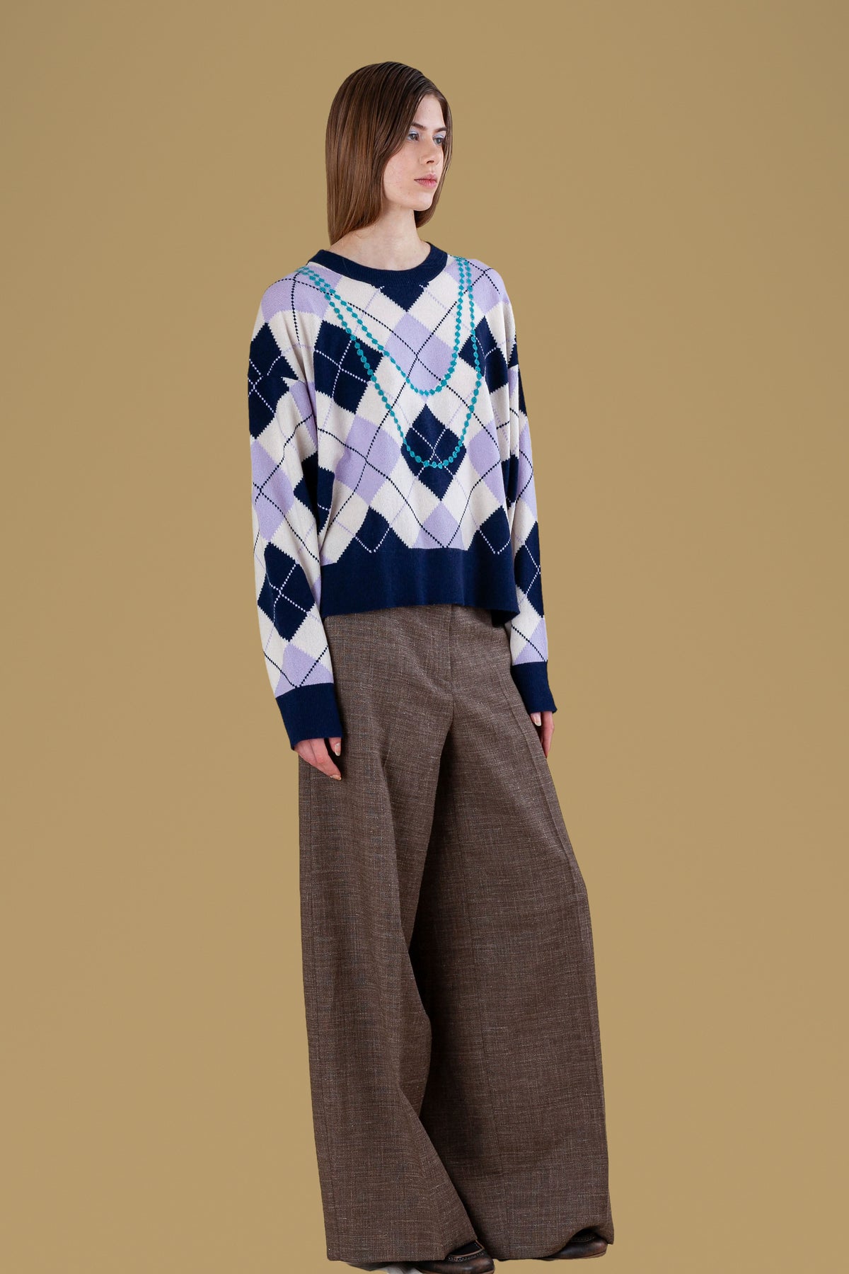 Argyle sweater with pearl embroidery, three-quarter view