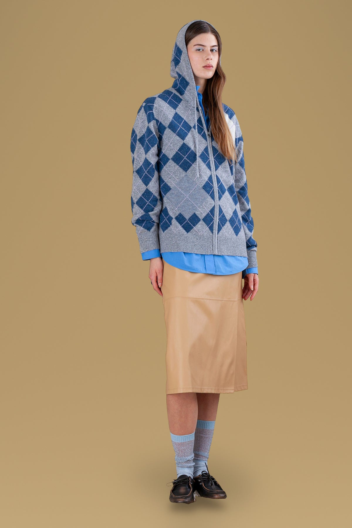 Argyle cashmere hoodie worn with the hood up