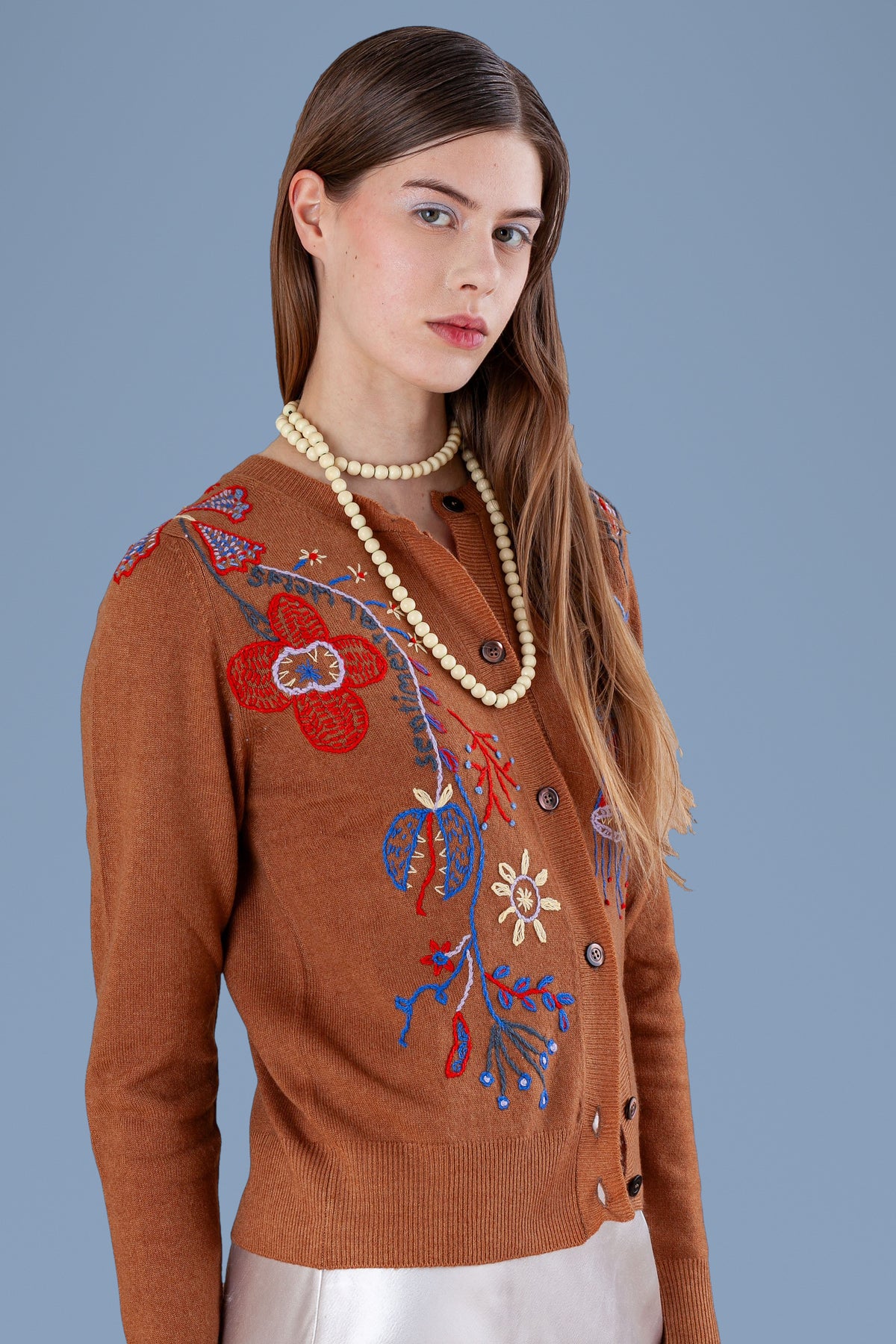 Cuoio hand-embroidered cardigan worn open, front view