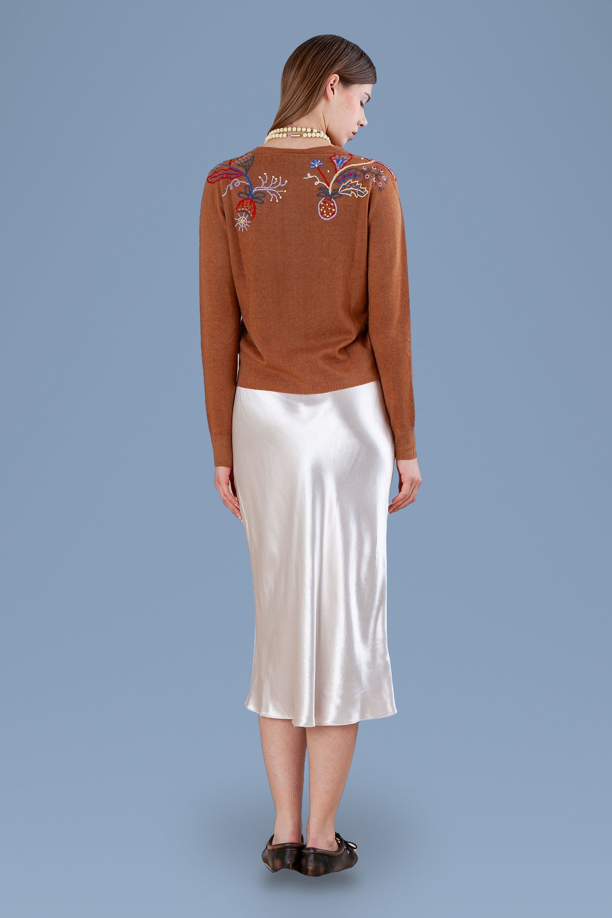 Brown cardigan, back view with embroidered shoulders