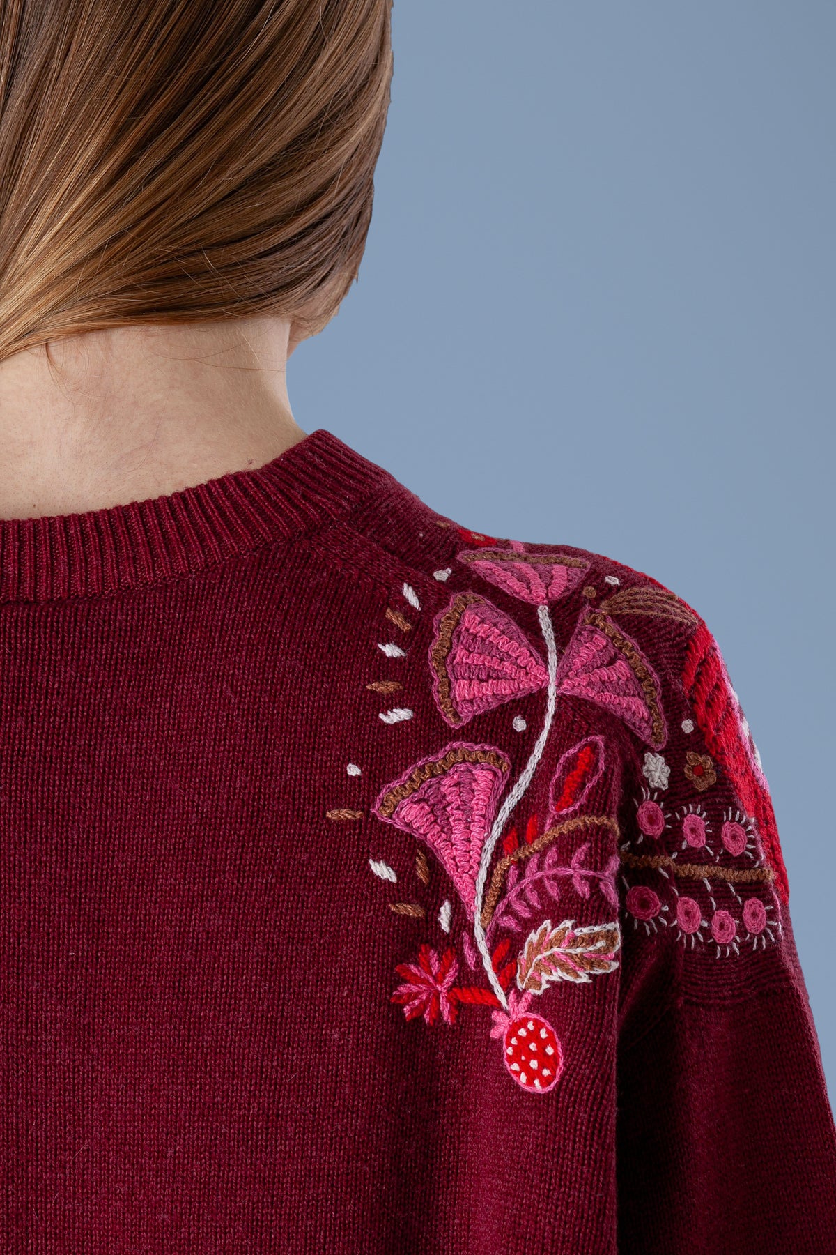 Back neck hand embroidery on burgundy sweater