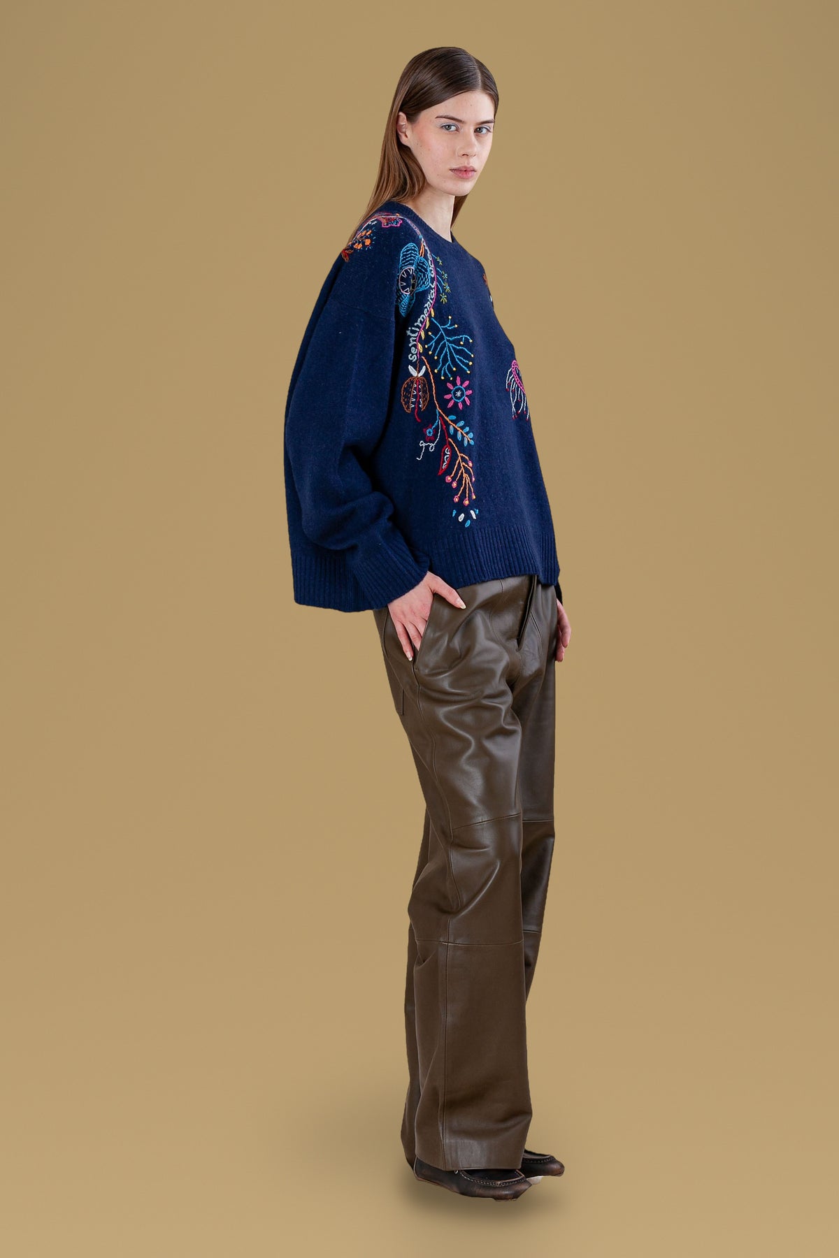 Navy relaxed crew sweater, side view, sleeve drape