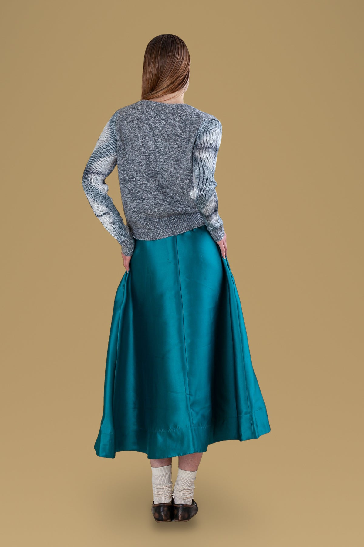 Grey cardigan with lurex sleeves, back view