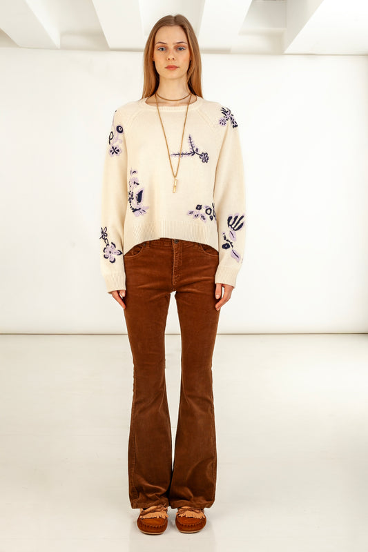 Ivory wool cashmere sweater front view – Happy Sheep

Close-up hand embroidery on ivory sweater

Ivory sweater texture detail – wool cashmere knit

Back view of Ivory Wool Cashmere Sweater