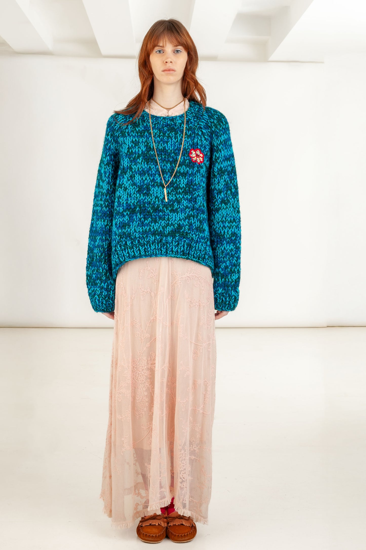 Ocean Bloom mouline sweater front view – Happy Sheep

Close-up floral embroidery detail on Ocean Bloom sweater

Ocean Bloom sweater back view – teal blend knit

Ocean Bloom sweater texture detail Happy Sheep