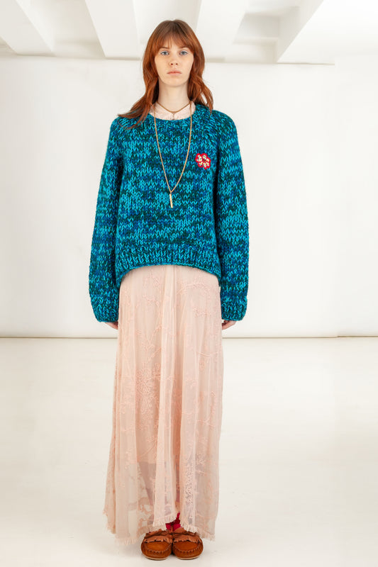 Ocean Bloom mouline sweater front view – Happy Sheep

Close-up floral embroidery detail on Ocean Bloom sweater

Ocean Bloom sweater back view – teal blend knit

Ocean Bloom sweater texture detail Happy Sheep