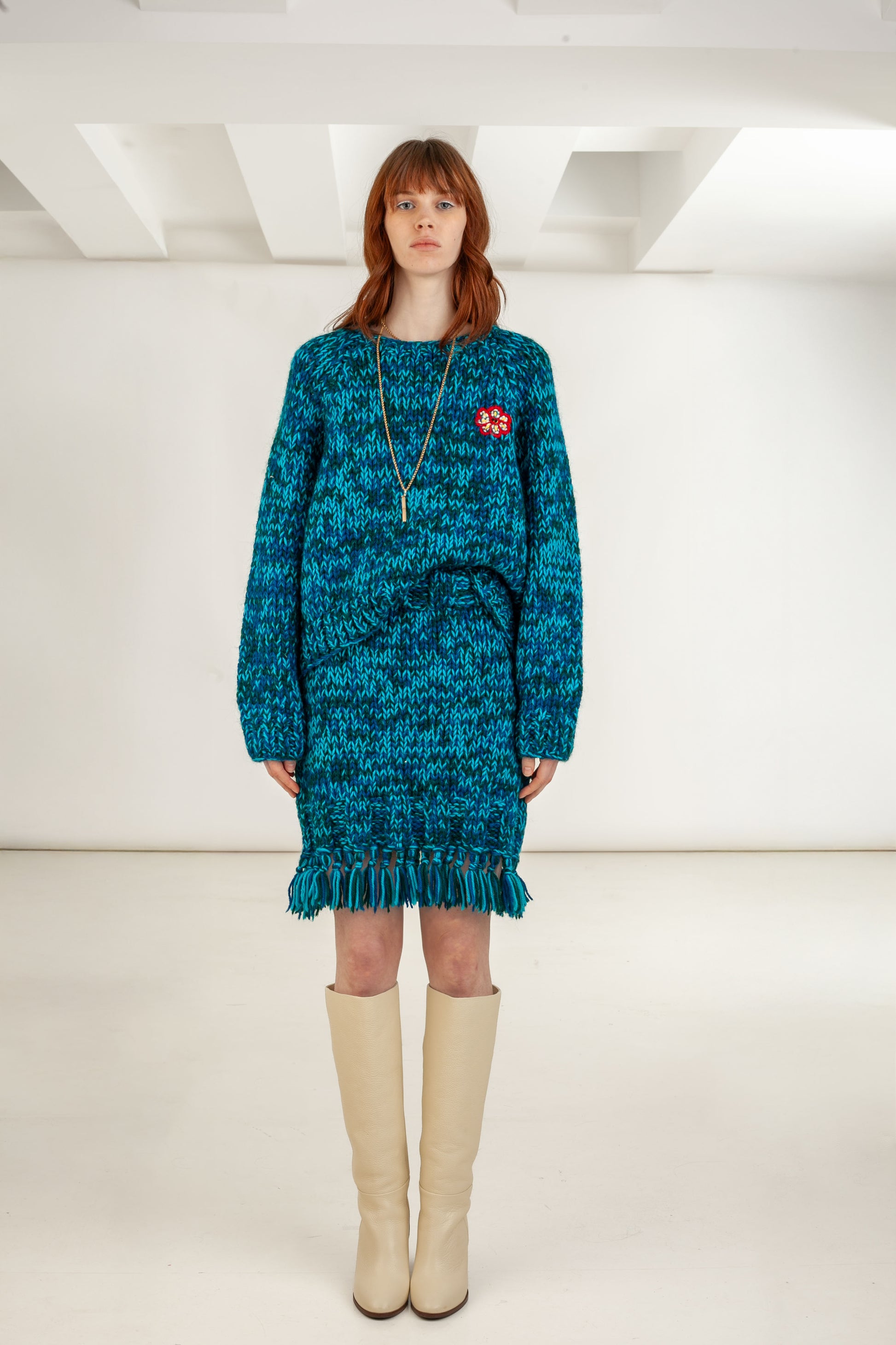 Ocean Bloom mouline sweater front view – Happy Sheep

Close-up floral embroidery detail on Ocean Bloom sweater

Ocean Bloom sweater back view – teal blend knit

Ocean Bloom sweater texture detail Happy Sheep