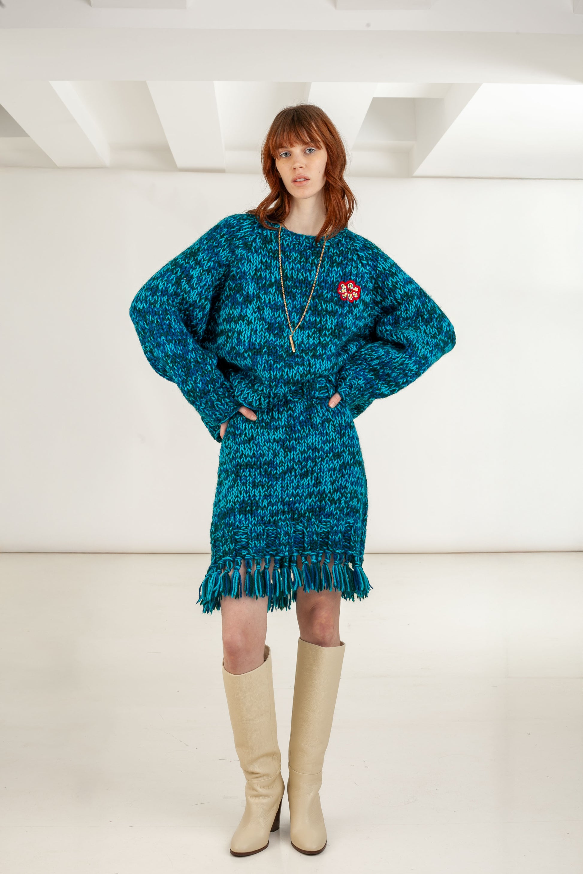 Ocean Bloom mouline sweater front view – Happy Sheep

Close-up floral embroidery detail on Ocean Bloom sweater

Ocean Bloom sweater back view – teal blend knit

Ocean Bloom sweater texture detail Happy Sheep