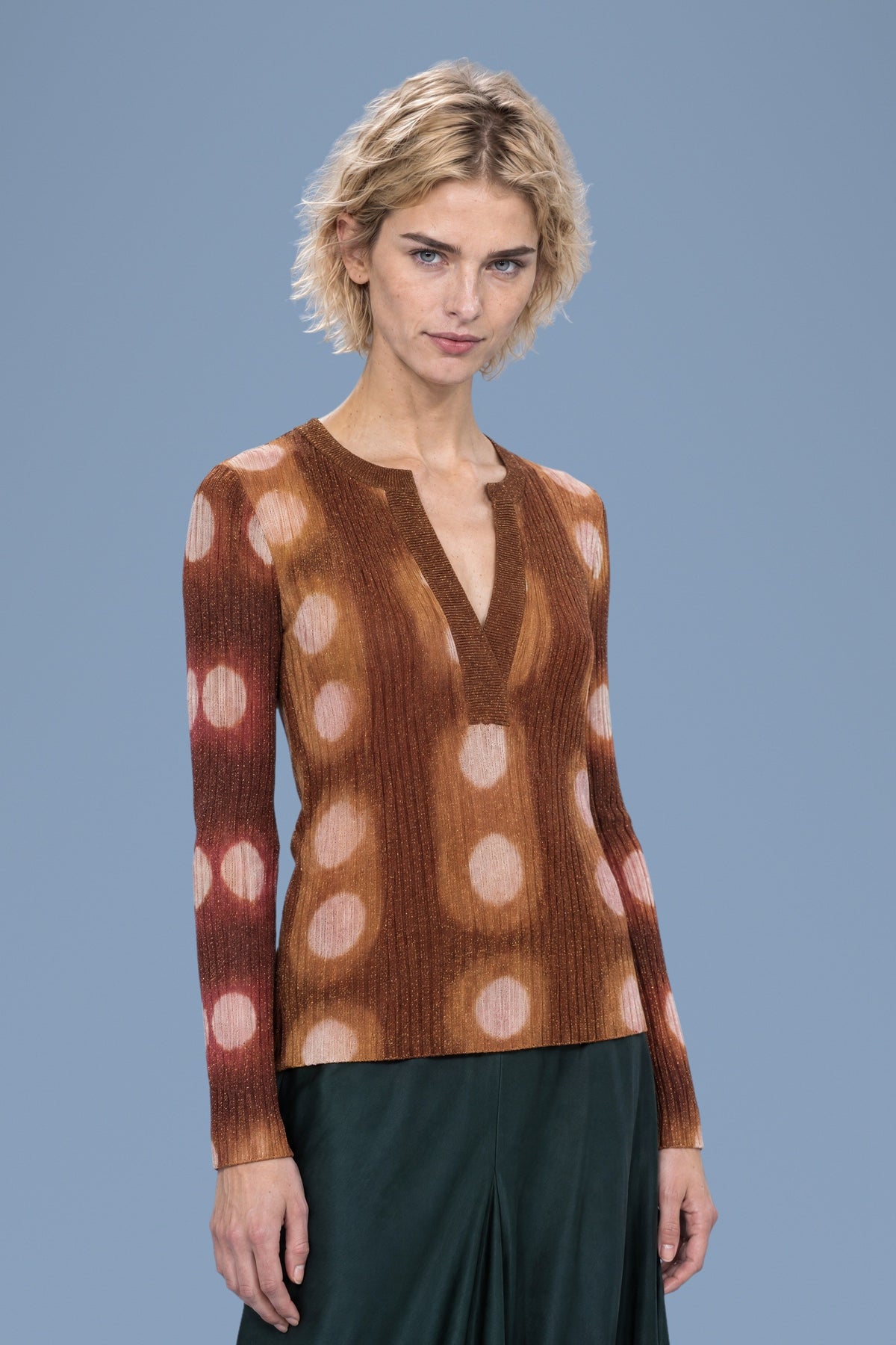 Brown tie-dye circles henley sweater, three-quarter view