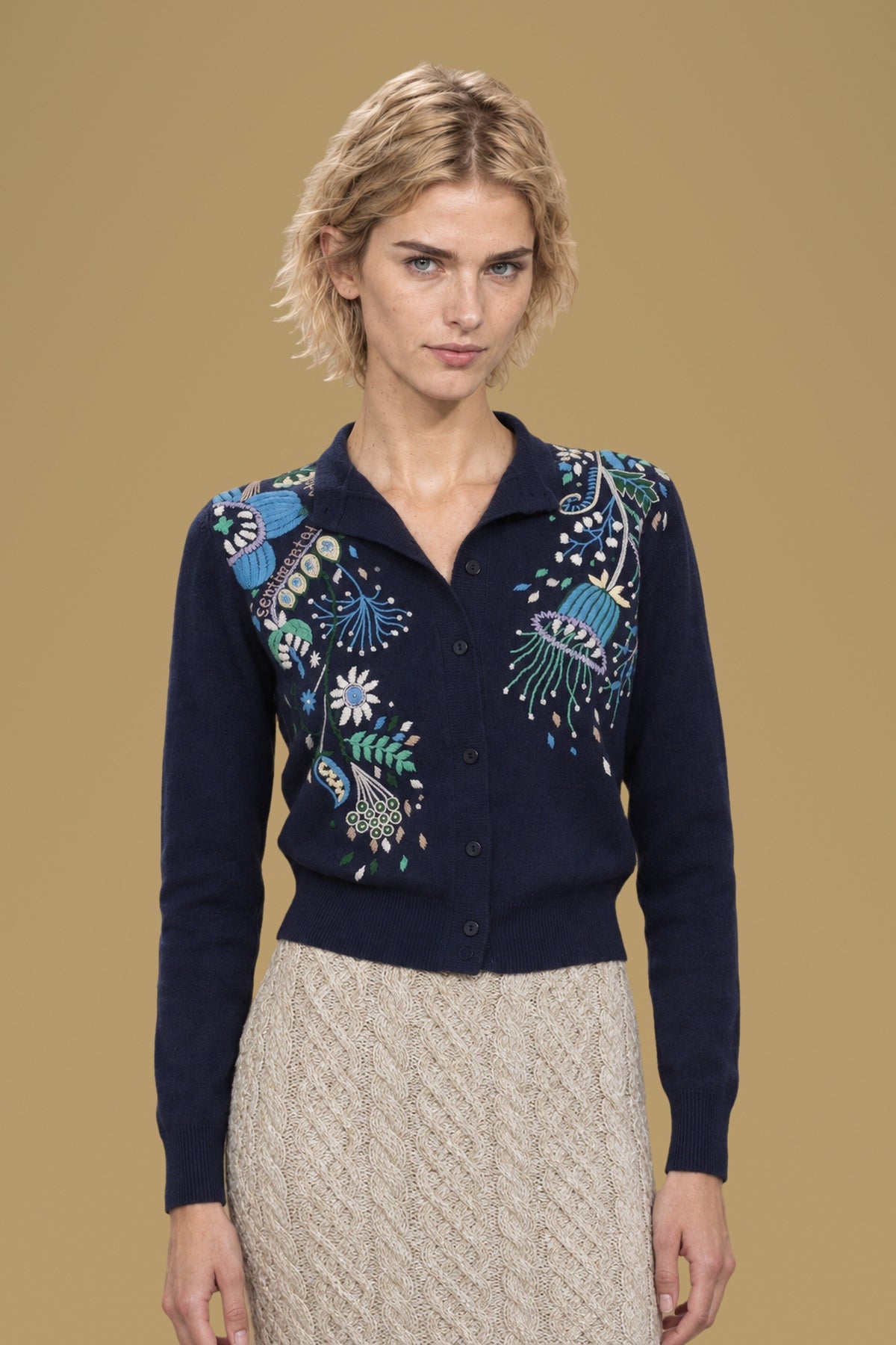 Navy Rebecchina cardigan, half-body view, hand embroidery on both front panels